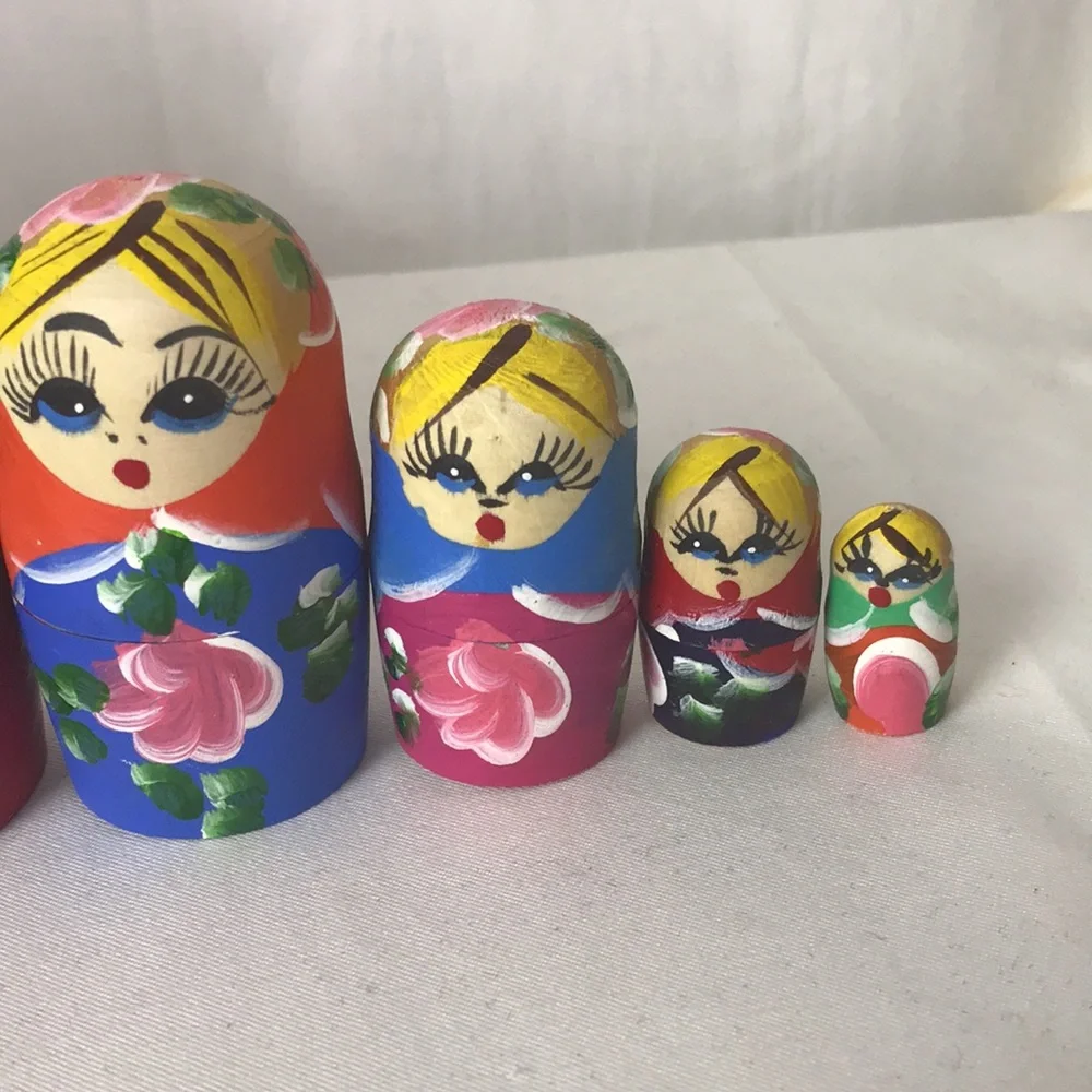 Beautifully decorated nesting dolls set